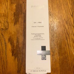 Symbiosis London CH + PDO Charcoal Micellar Water — White